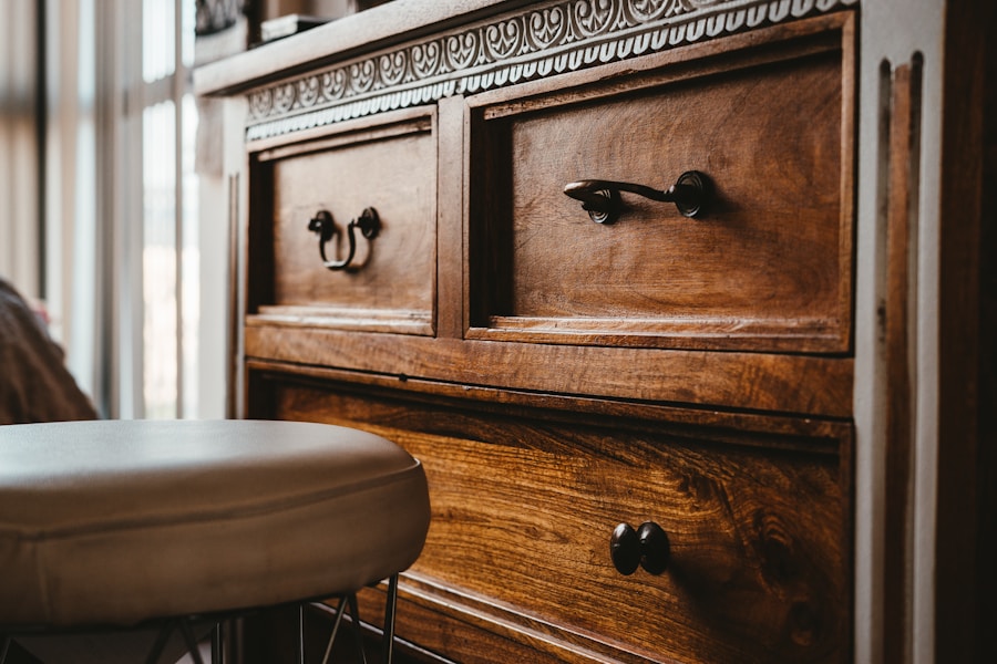 Carved walnut sideboard with brass drawer pulls